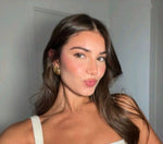 Celia M.